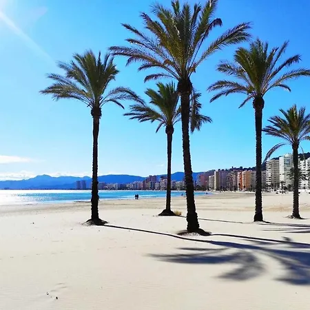 En Playa De *